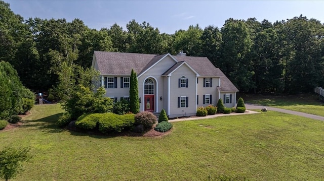 colonial house with a front lawn