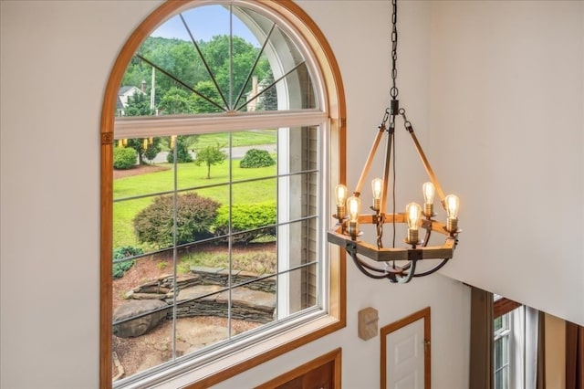 details featuring an inviting chandelier