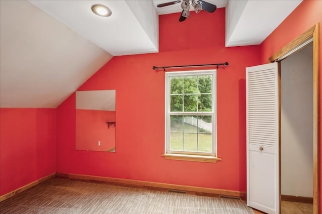 bonus room featuring ceiling fan and vaulted ceiling