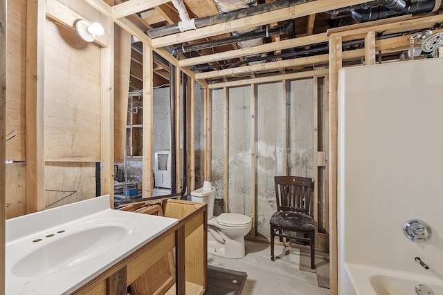 full bathroom featuring bathing tub / shower combination, vanity, and toilet