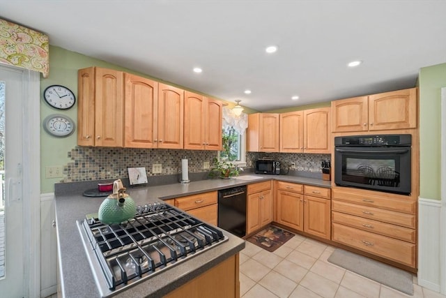 kitchen with light brown cabinets, black appliances, light tile patterned flooring, backsplash, and recessed lighting