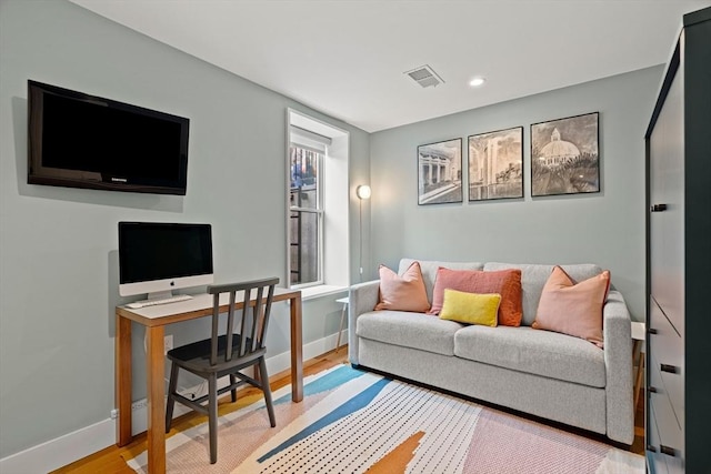 office featuring baseboards, recessed lighting, visible vents, and wood finished floors