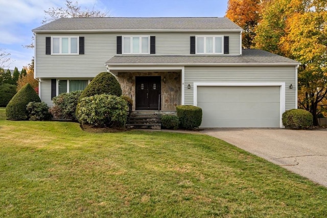 traditional-style house featuring stone siding, driveway, and a front lawn