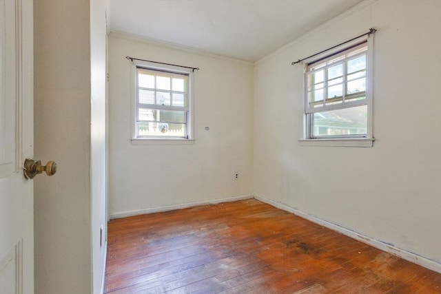 91 Baxter Rd, Barnstable, MA 02601 - spare room featuring crown molding, wood-type flooring, and baseboards