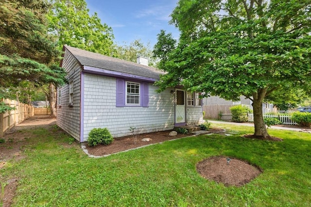 91 Baxter Rd, Barnstable, MA 02601 - view of front of property featuring a chimney and a shingled roof