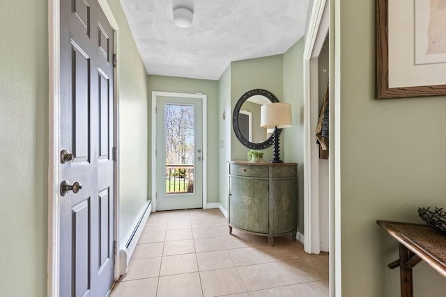 doorway to outside with light tile patterned floors, baseboards, and baseboard heating