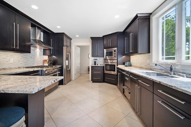 2 Nikkis Way, Hadley, MA 01035 - kitchen with wall chimney exhaust hood, high end appliances, plenty of natural light, light tile patterned flooring, and recessed lighting