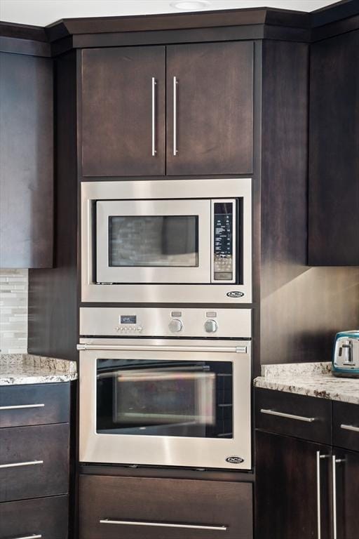 2 Nikkis Way, Hadley, MA 01035 - kitchen featuring stainless steel appliances, dark brown cabinets, and light stone countertops