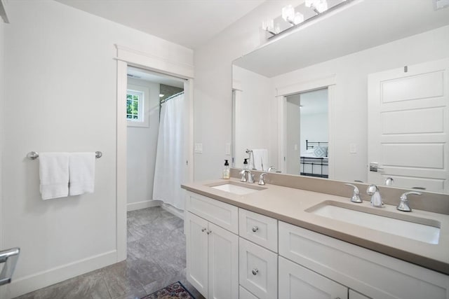 2 Nikkis Way, Hadley, MA 01035 - bathroom featuring double vanity and a shower with curtain