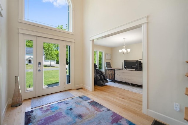 2 Nikkis Way, Hadley, MA 01035 - foyer entrance with wood finished floors, a chandelier, and a high ceiling