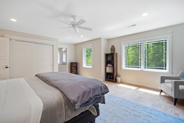 2 Nikkis Way, Hadley, MA 01035 - bedroom featuring multiple windows, wood finished floors, recessed lighting, a ceiling fan, and a closet