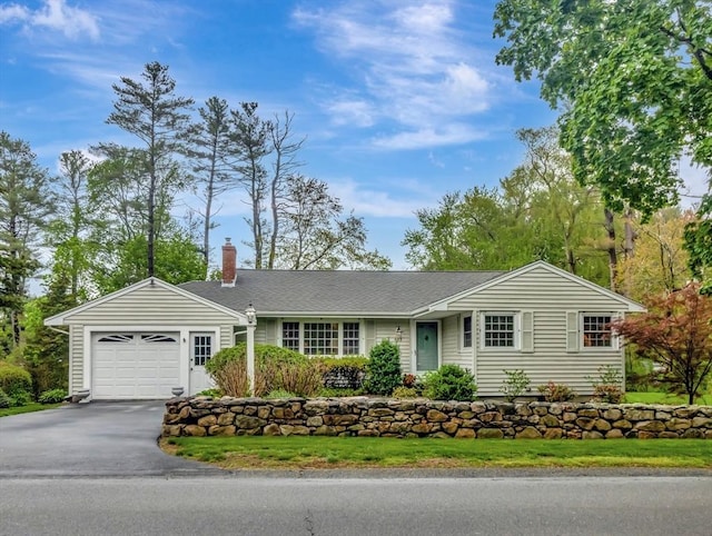 442 Purchase St, Easton, MA 02375 - ranch-style home with a chimney, driveway, an attached garage, and a front lawn