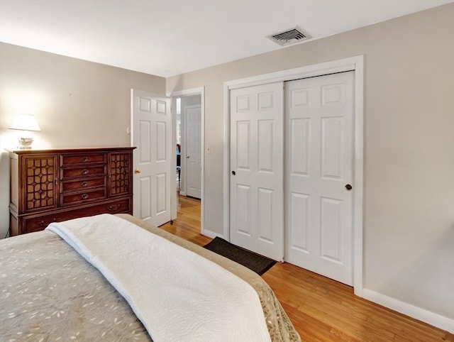 442 Purchase St, Easton, MA 02375 - bedroom with light wood-type flooring, baseboards, and a closet