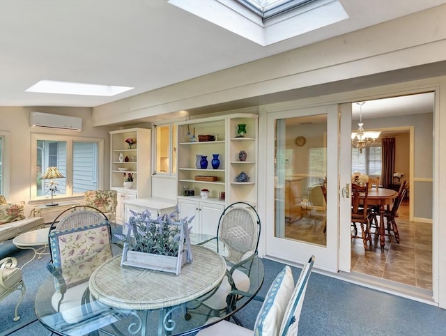 442 Purchase St, Easton, MA 02375 - dining space featuring a skylight, a wall mounted air conditioner, and a chandelier