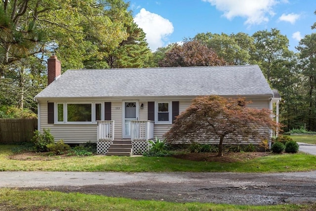 ranch-style house with a front yard