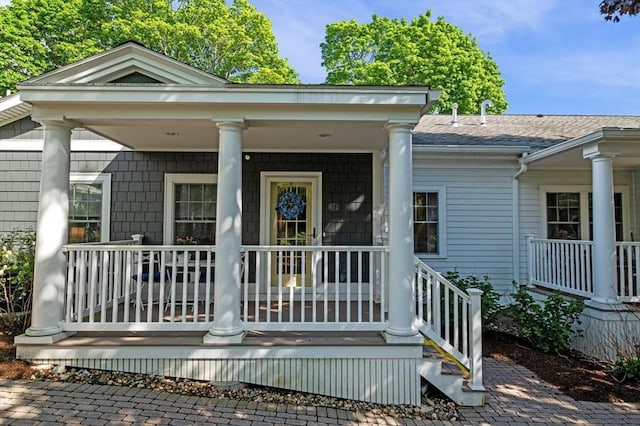 16 Green St Unit 11, Ipswich, MA 01938 - doorway to property featuring a porch and roof with shingles