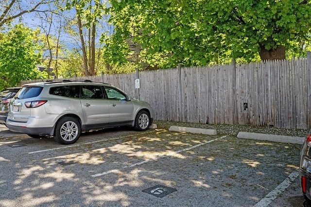 16 Green St Unit 11, Ipswich, MA 01938 - uncovered parking lot featuring fence