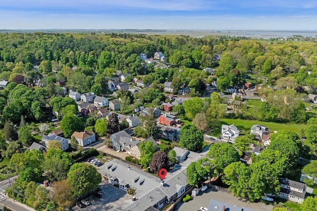 16 Green St Unit 11, Ipswich, MA 01938 - aerial view of property and surrounding area featuring a forest and nearby suburban area
