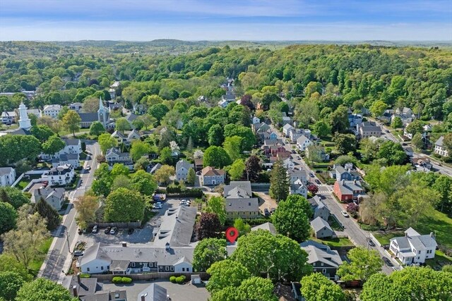 16 Green St Unit 11, Ipswich, MA 01938 - aerial view of property and surrounding area with nearby suburban area and a forest