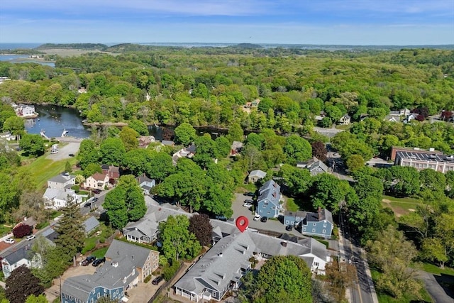 16 Green St Unit 11, Ipswich, MA 01938 - view of property location with a heavily wooded area, a large body of water, and nearby suburban area