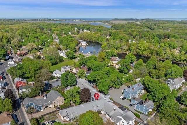 16 Green St Unit 11, Ipswich, MA 01938 - aerial overview of property's location with a nearby body of water, a heavily wooded area, and nearby suburban area