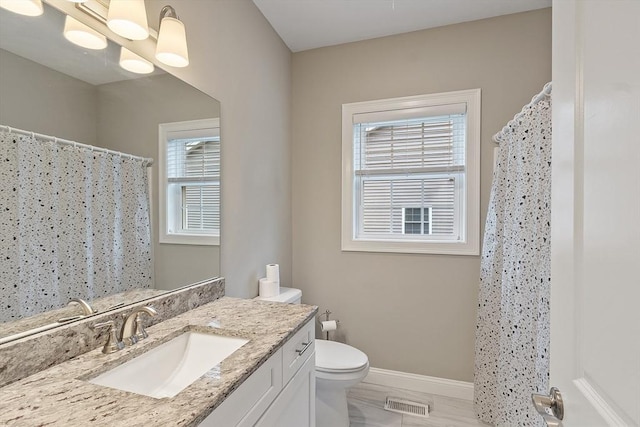 295 Sewall St Unit 295, Boylston, MA 01505 - full bath with vanity, toilet, baseboards, and a shower with shower curtain