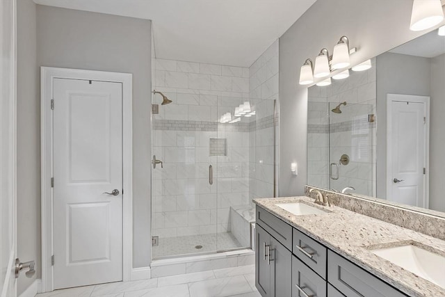 295 Sewall St Unit 295, Boylston, MA 01505 - bathroom with a shower stall, double vanity, and marble finish flooring