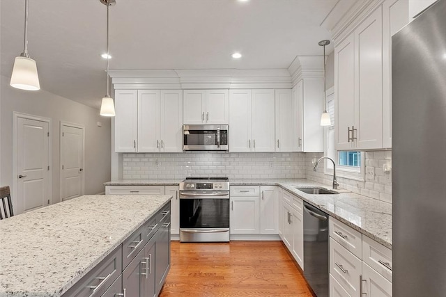 295 Sewall St Unit 295, Boylston, MA 01505 - kitchen featuring stainless steel appliances, a sink, gray cabinetry, white cabinetry, and recessed lighting