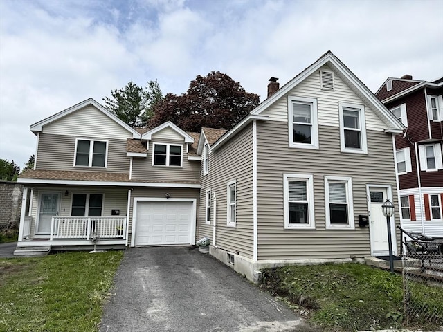 34 Cutler St, Worcester, MA 01604 - view of property featuring driveway, a porch, a chimney, and a front yard