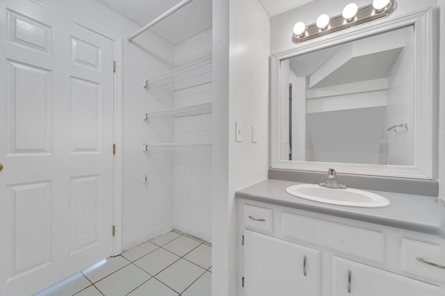 360 Littleton Unit D1, Chelmsford, MA 01824 - bathroom featuring vanity, tile patterned flooring, and a closet
