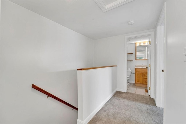 360 Littleton Unit D1, Chelmsford, MA 01824 - hall featuring an upstairs landing, light carpet, and baseboards