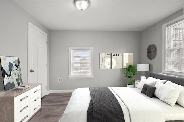 78-82 3rd St, Lowell, MA 01850 - bedroom with dark wood finished floors and baseboards