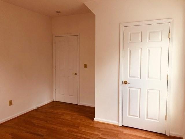 78-82 3rd St, Lowell, MA 01850 - unfurnished bedroom featuring wood finished floors and baseboards
