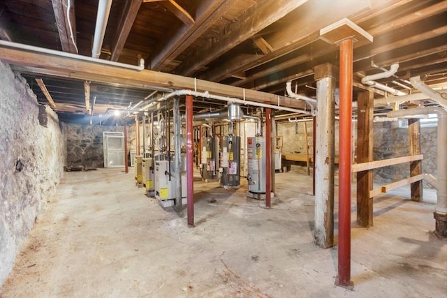 78-82 3rd St, Lowell, MA 01850 - unfinished below grade area with gas water heater and a heating unit