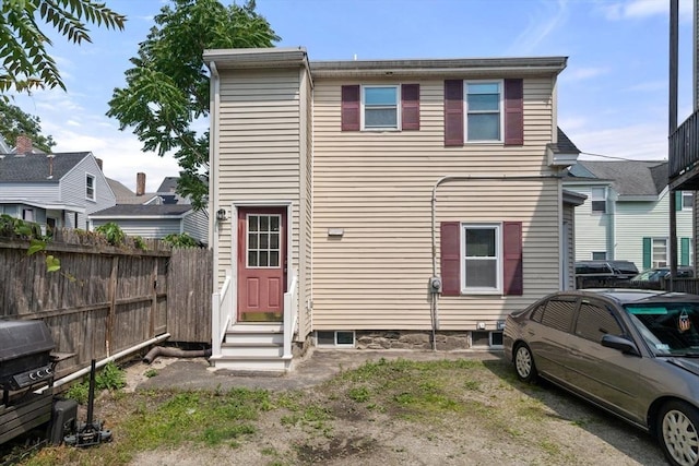 78-82 3rd St, Lowell, MA 01850 - rear view of property featuring entry steps