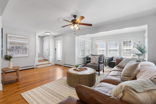21 Ames, Lynn, MA 01905 - living room featuring baseboard heating, a ceiling fan, plenty of natural light, and light wood-type flooring