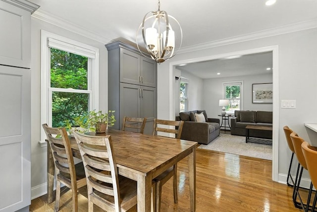 6 Flagg Dr, Framingham, MA 01702 - dining room featuring a chandelier, ornamental molding, light wood-type flooring, and recessed lighting