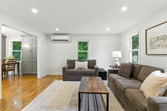 6 Flagg Dr, Framingham, MA 01702 - living area featuring a wall mounted air conditioner, light wood finished floors, and recessed lighting