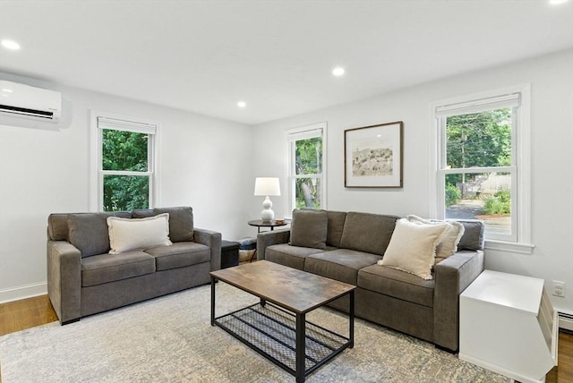 6 Flagg Dr, Framingham, MA 01702 - living room featuring a wall mounted AC, wood finished floors, plenty of natural light, recessed lighting, and a baseboard heating unit