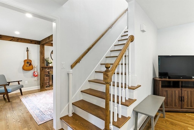6 Flagg Dr, Framingham, MA 01702 - staircase with wood finished floors and recessed lighting