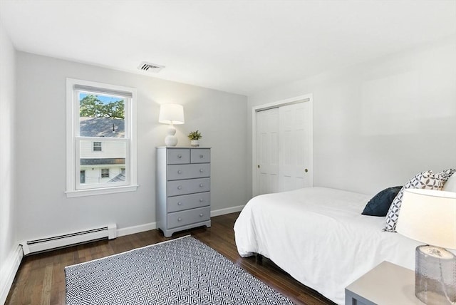 6 Flagg Dr, Framingham, MA 01702 - bedroom featuring wood finished floors, a closet, and a baseboard radiator