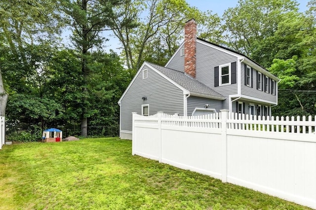 6 Flagg Dr, Framingham, MA 01702 - view of side of property with a chimney and roof with shingles