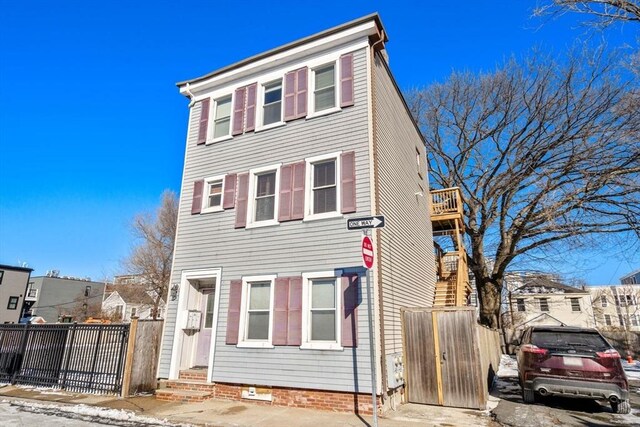 372 Athens St Unit 3, Boston, MA 02127 - view of front of house featuring entry steps and fence