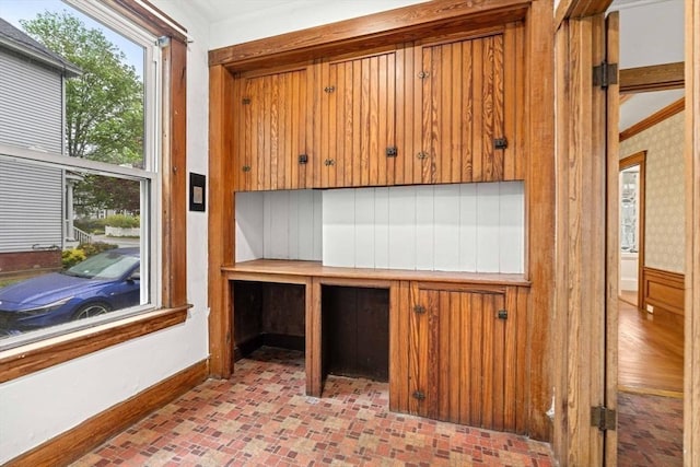 unfurnished office with baseboards