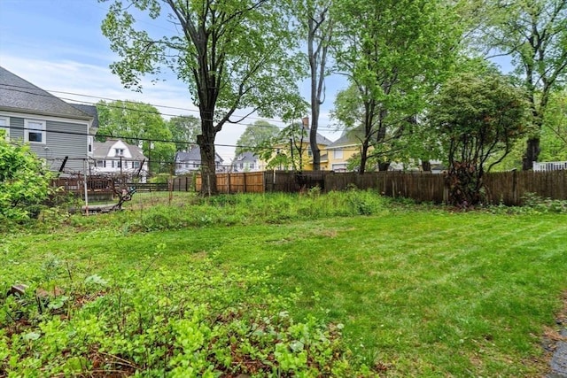 view of yard featuring fence