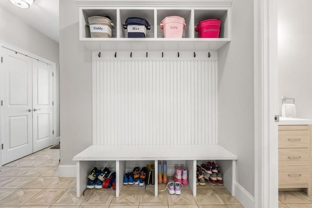 mudroom featuring baseboards