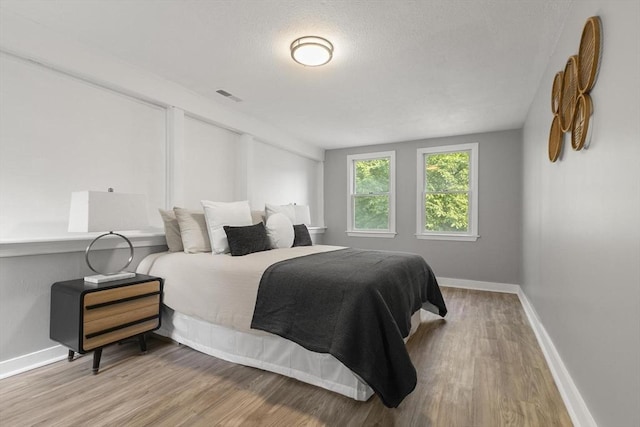 235 Groton Rd, Chelmsford, MA 01863 - bedroom with wood finished floors and baseboards