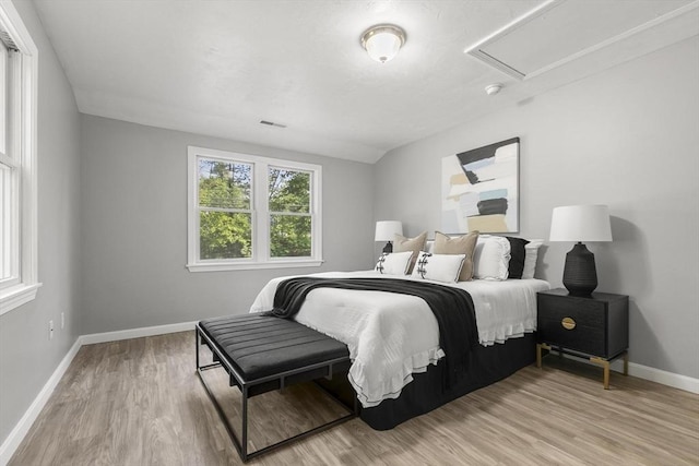 235 Groton Rd, Chelmsford, MA 01863 - bedroom with baseboards and light wood finished floors