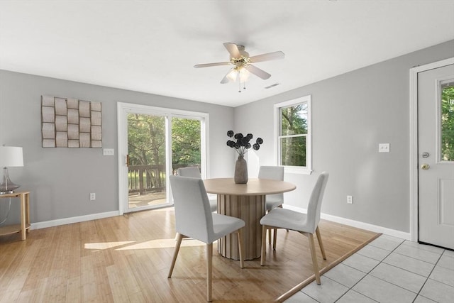235 Groton Rd, Chelmsford, MA 01863 - dining area with a ceiling fan, plenty of natural light, baseboards, and light wood-style floors