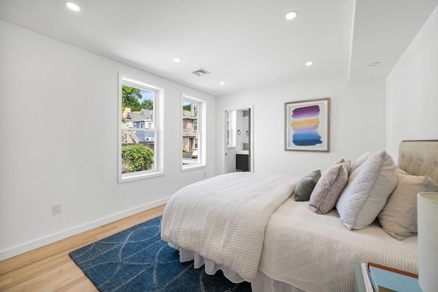 bedroom featuring hardwood / wood-style floors